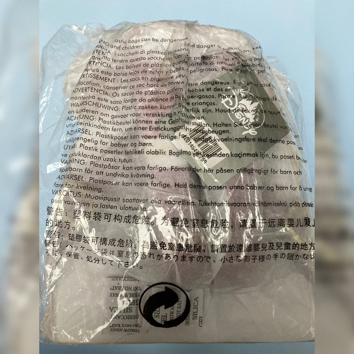 Disney Parks Loungefly Minnie Mouse mini backpack with gold holographic details, still wrapped in original packaging with Disney Tag visible from the back