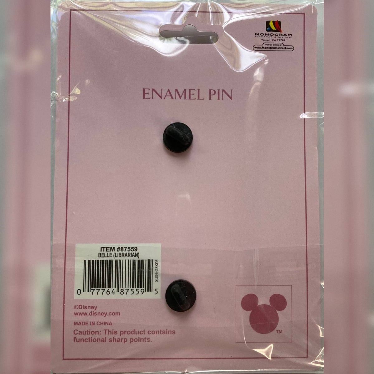 Pink a la Mode Belle Librarian pin on original collector card showing white bar code block.