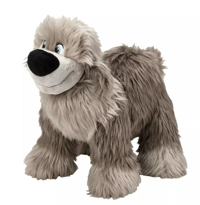 A picture of Disney's Max the sheepdog plush with cream and gray fur photographed on a plain white background.