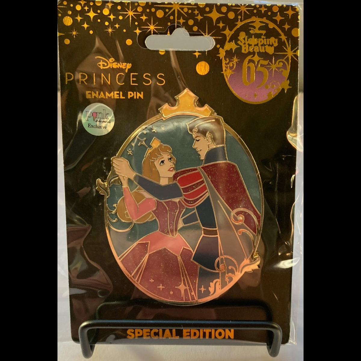 PALM Disney Princess Special Edition 65th Anniversary enamel pin in its original packaging featuring Aurora and Phillip