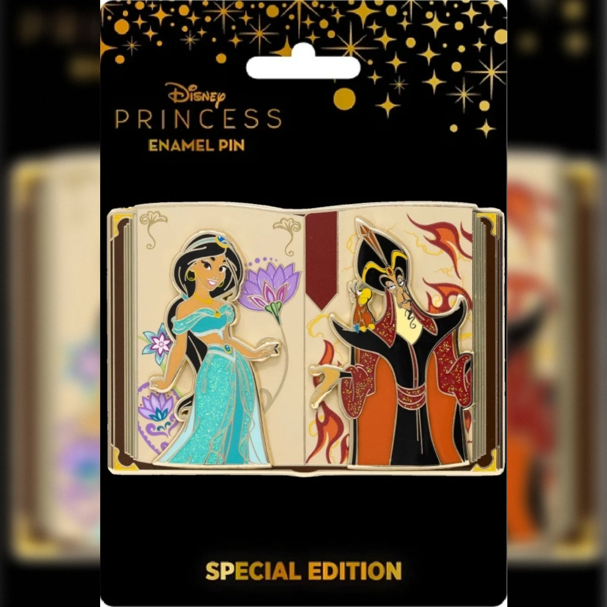 Pink a la Mode LE 300 Disney Aladdin storybook pin featuring Princess Jasmine and Jafar with Iago on original black-and-gold backing card.